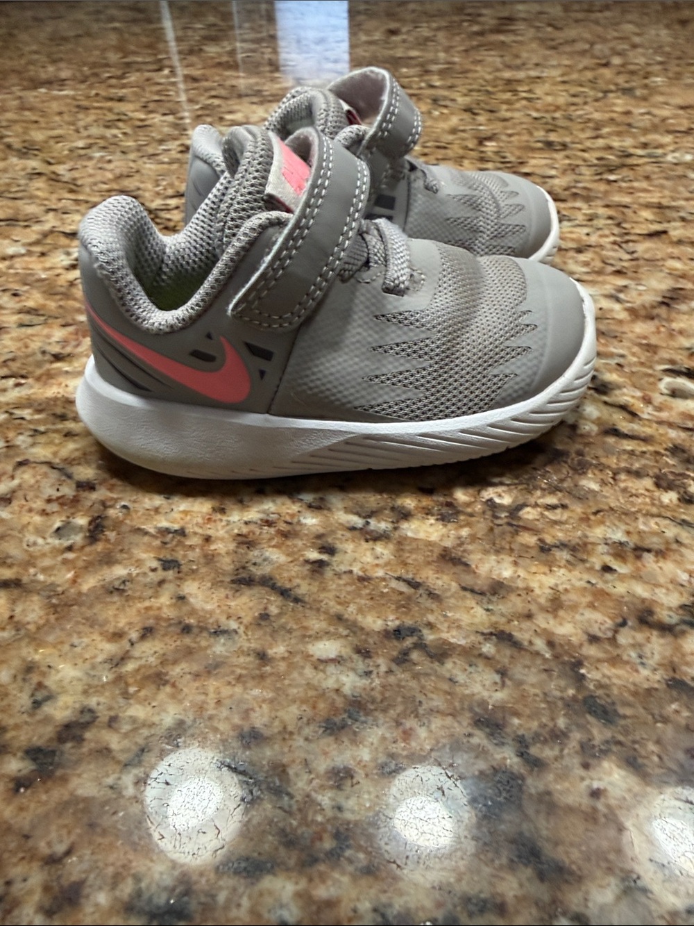 Nike Star Runner with pink swoosh size 4c